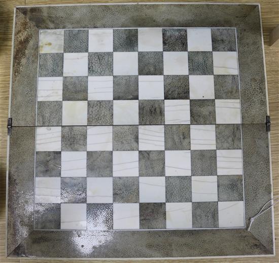 A Victorian ivory and shagreen folding chessboard